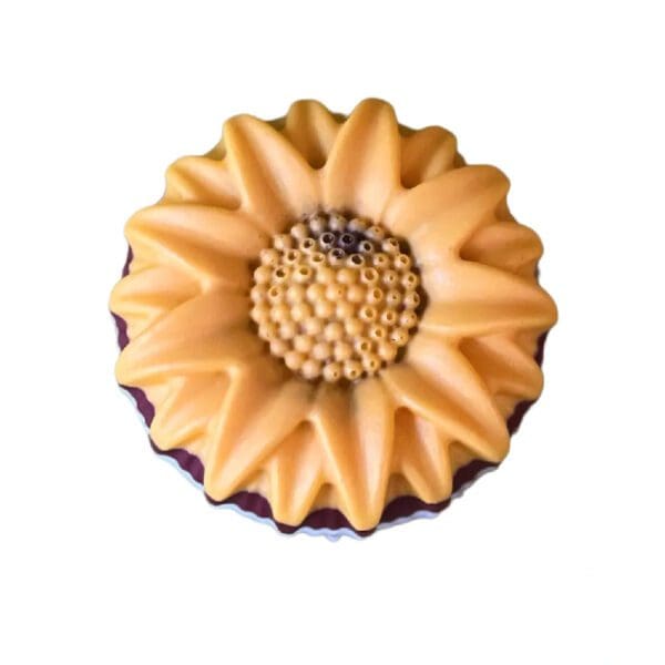 Yellow sunflower shaped soap bar.