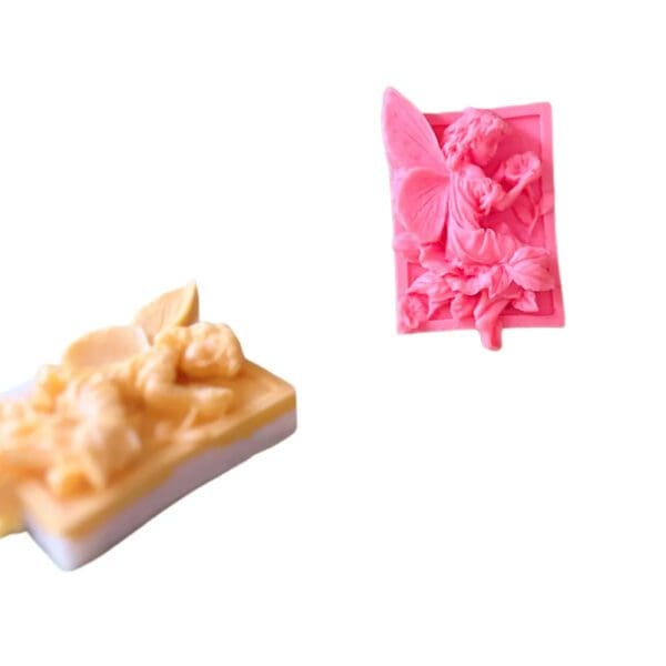 Two pink and yellow floral soap bars.