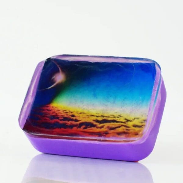 Purple soap with sky and clouds design.