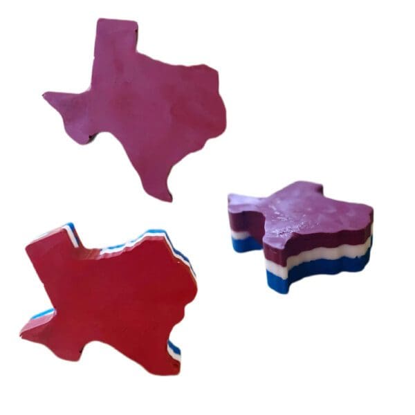 Three layered Texas shaped erasers.