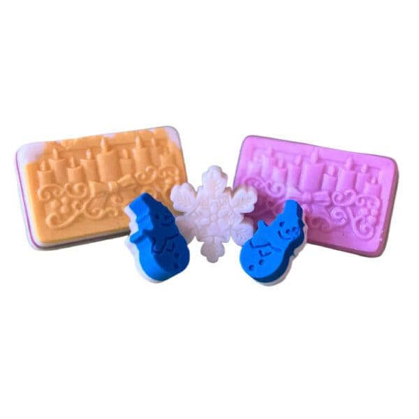 Holiday-themed soap bars and snowman shapes.