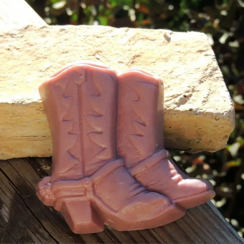 Pair of cowboy boot shaped soaps.